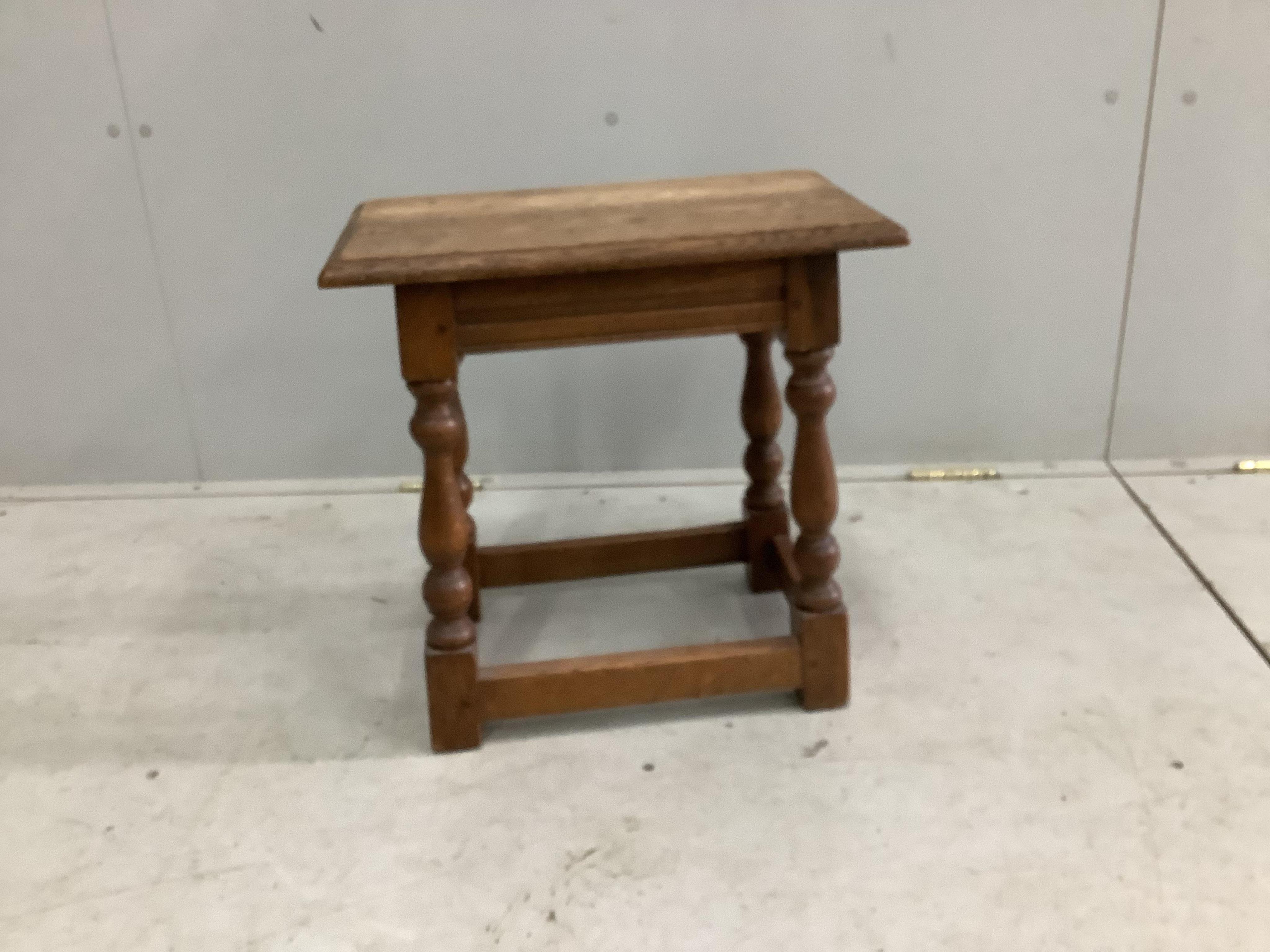 An 18th century style oak joint stool, width 44cm, depth 27cm, height 44cm. Condition - fair